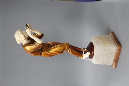 An Art Deco style resin figure of a lady, height 28cm